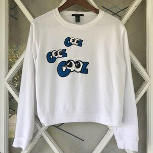 C👀L fuzzy appliqué sweatshirt